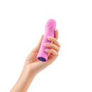FemmeFunn Hana Thumping Bullet Vibrator Pink held in hand showcasing its ergonomic design.