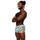 Male Power The Matchmaker Seamless Sheer Short Flamingo L showcased on a smiling model with a tropical design.