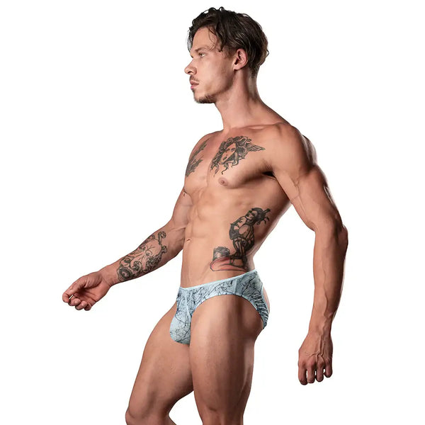 Ultimate Duo Crr Moonshine Mini Light Blue L XL Male Power showcased by a model with tattoos.
