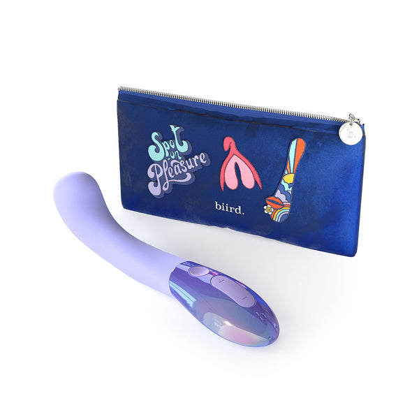 Biird Gii Glow Vibrator Lilac next to a stylish carrying case featuring playful designs.
