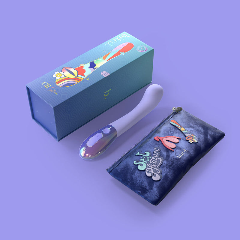 Biird Gii Glow Vibrator Lilac and storage pouch with colorful design, positioned on a soft purple background.