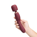 Le Wand Flat Top Fusion G Double End Vibrator held in hand showcasing its sleek design and ergonomic features.