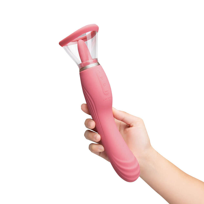 Le Wand Lick Double Ended Massager in hand showcasing its sleek design and dual functionality for ultimate pleasure.
