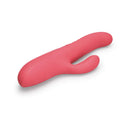 Le Wand Thrust Rabbit Vibrator in vibrant pink silicone, designed for dual stimulation and pleasure.