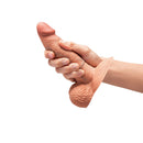 b-Vibe Slipskin Realistic Silicone Dildo 6 inch Girthy Mocha held in hand to showcase its realistic design.