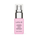 LELO Pleasure Enhancing Serum 0.5 Oz in a sleek pink bottle with a pump top for boosting pleasure.