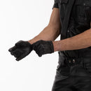 Prowler RED Leather Gloves 2XL Black being worn by a model adjusting them on a white background.