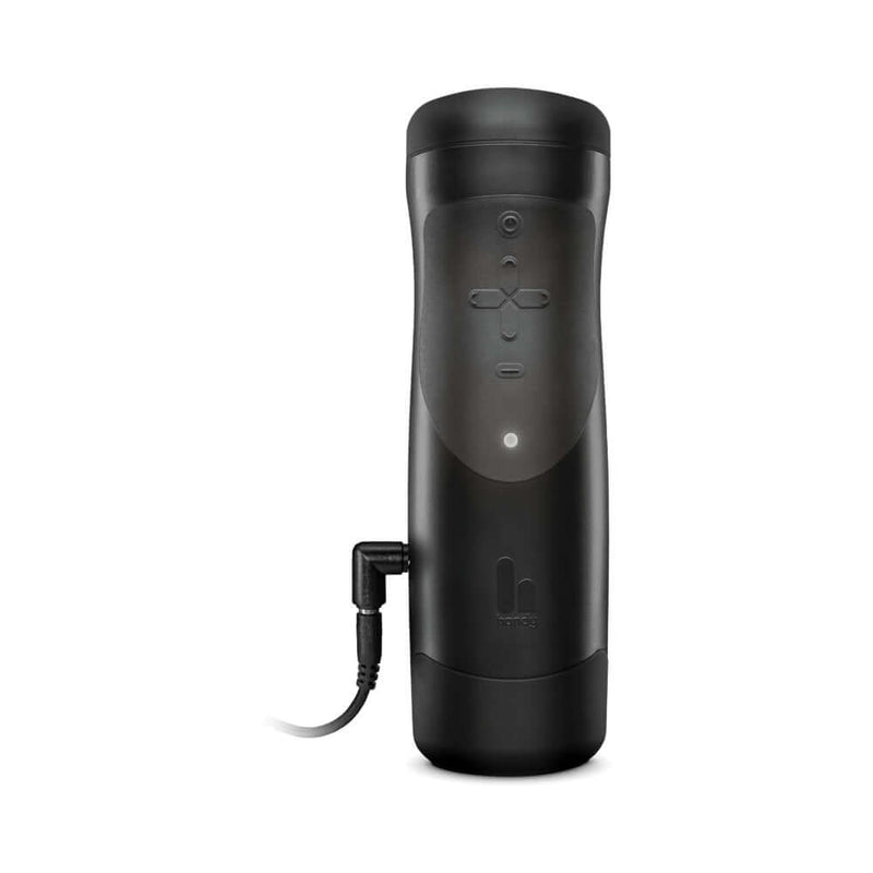 The Handy Interactive Stroker, a sleek black interactive masturbation device with control panel and charging port.
