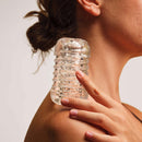 The Handy Dream Collection Touch Sleeve held in hand, showcasing its unique ribbed texture and open-ended design.