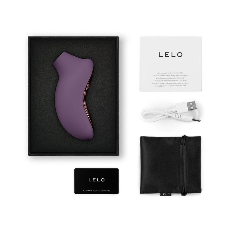 LELO SONA 3 Cruise Clitoral Stimulator Plum with packaging and accessories including USB cable and storage pouch.