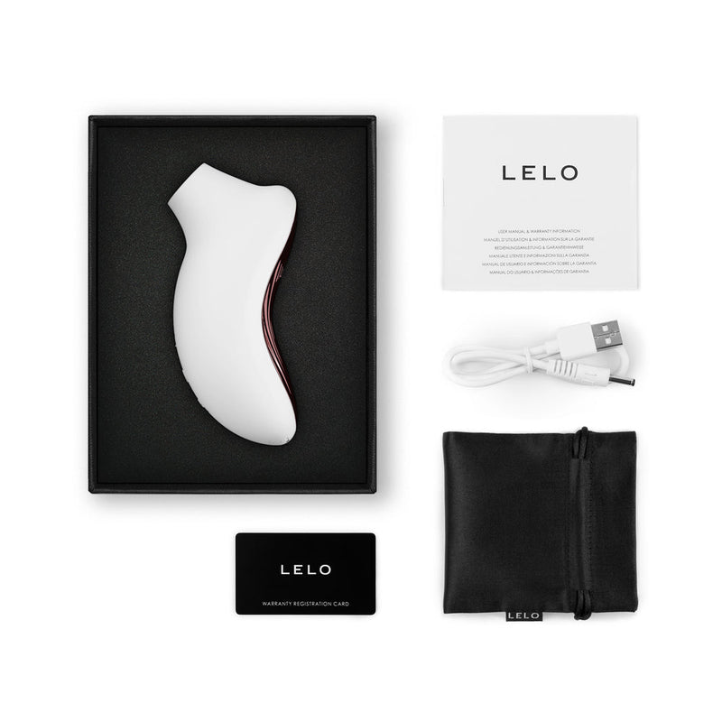 LELO SONA 3 Clitoral Stimulator Cream in packaging with accessories, including charger and user guide.