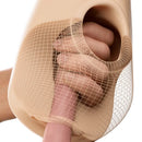 Close-up of the PDX Plus Pussy Pounder Squeeze Stroker Light demonstrating its realistic design and squeeze feature.