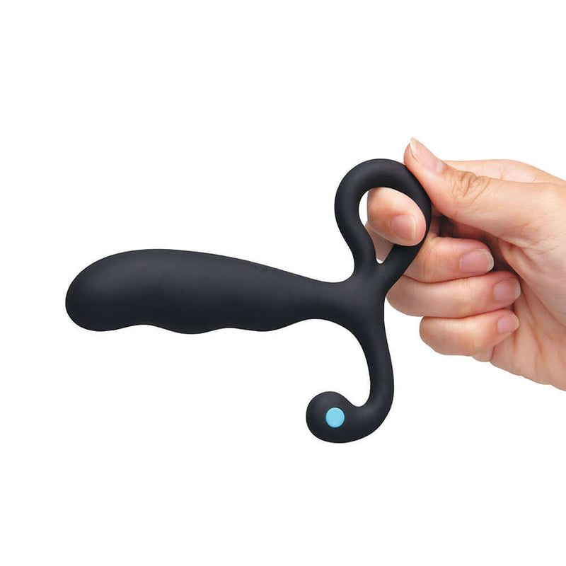 b-Vibe P-Spot Vibing Prostate Massager held in hand, showcasing its sleek and ergonomic design for prostate pleasure.