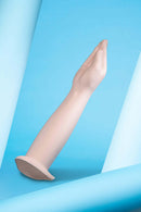 b-Vibe Silicone Hand Fisting Dildo showcased with a realistic arm-shaped structure on a blue background.