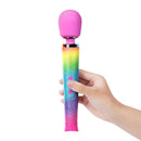 Le Wand Petite All That Glimmers Ombre Massager held in hand featuring colorful ombre design.