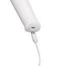 Le Wand Classique Petite Wand Massager charging port showing USB connection for easy recharging.
