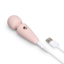 Le Wand Mini Micro Wand Rose Gold compact massager with USB charging cable for discreet pleasure.
