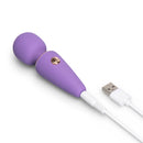 Le Wand Mini Micro Wand Vibrator Violet with USB charging cable, compact and designed for discreet pleasure.