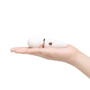 Le Wand Mini Micro Wand White held in hand, showcasing its compact, travel-friendly design.