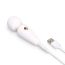 Le Wand Mini Micro Wand White shown with USB charging cable, emphasizing its portable and rechargeable design.