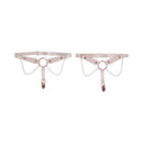 Sportsheets Sex and Mischief Peaches n CreaMe Pearl Garters showcasing soft faux leather, pearl strands, and rose gold O-ring.