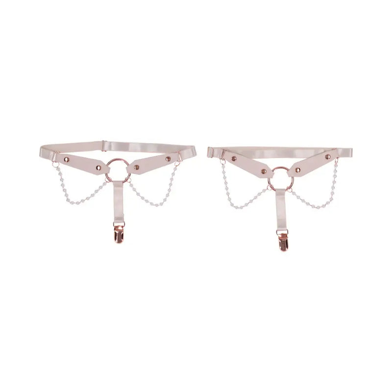 Sportsheets Sex and Mischief Peaches n CreaMe Pearl Garters showcasing soft faux leather, pearl strands, and rose gold O-ring.