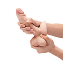 Hand holding b-Vibe Slipskin Realistic Silicone Dildo 6 inch Girthy Cream showcasing its lifelike texture and design.