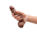 b-Vibe Slipskin Realistic Silicone Dildo 6 inch Girthy Brown in hand showcasing its lifelike design and texture.