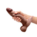 b-Vibe Slipskin Realistic Silicone Dildo 8 inch Girthy Brown held in hand for realistic sensation.