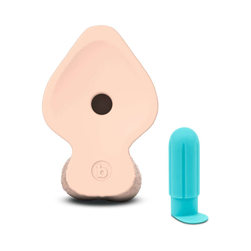 b Vibe Slipskin Realistic Silicone Dildo 9 inches Girthy Cream with accompanying blue bullet vibrator