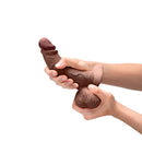 b-Vibe Slipskin Realistic Silicone Dildo 6.5 inch Curved Brown being held in hands, showcasing its lifelike design.