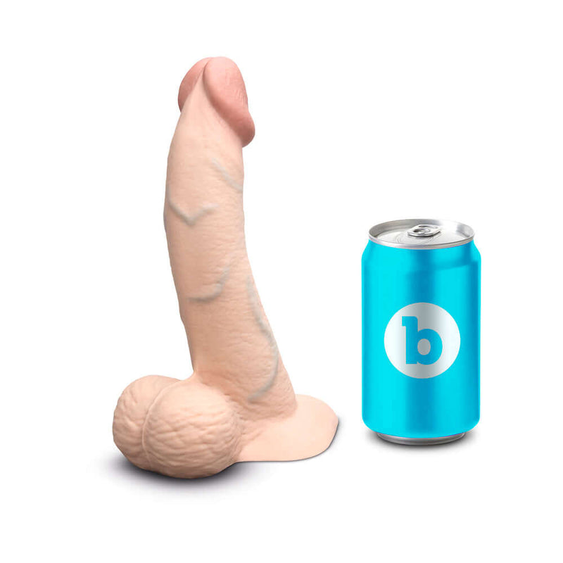 b-Vibe Slipskin Realistic Silicone Dildo 8 inch Curved Cream next to a blue can for size comparison.