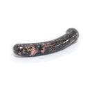 Chakrubs Anahata Curve Rhodonite Wand showcasing its sleek design and unique rhodonite crystal details.