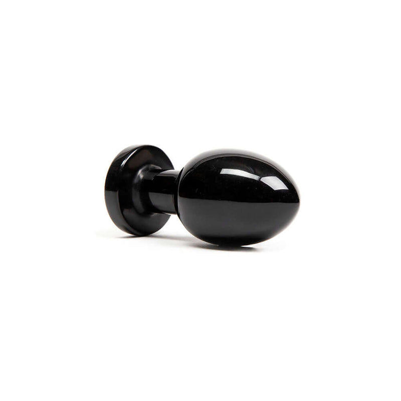 Chakrubs Xaga Root Obsidian Plug, a sleek black obsidian anal pleasure tool designed to awaken your root chakra.