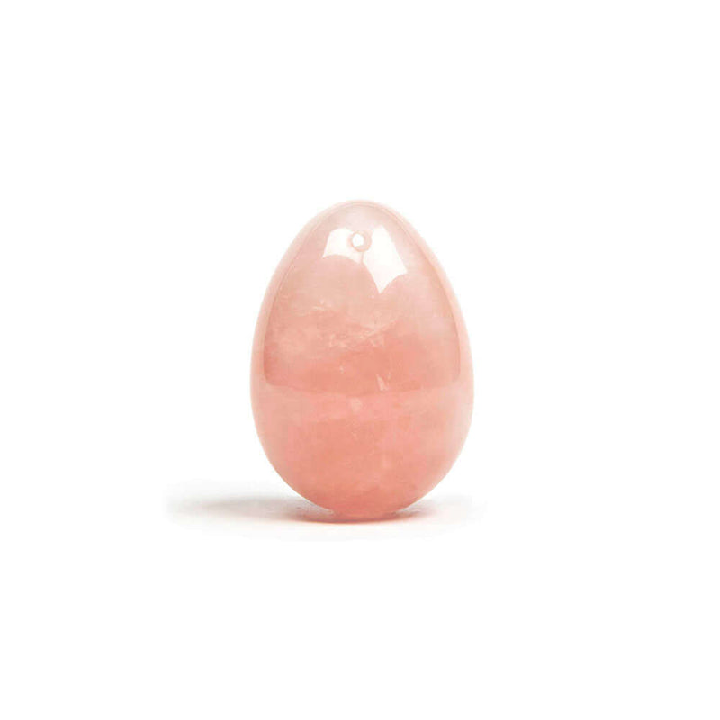 Chakrubs Heart Yoni Egg Rose Quartz drilled in a polished light pink design, ideal for pelvic floor strengthening and emotional healing.
