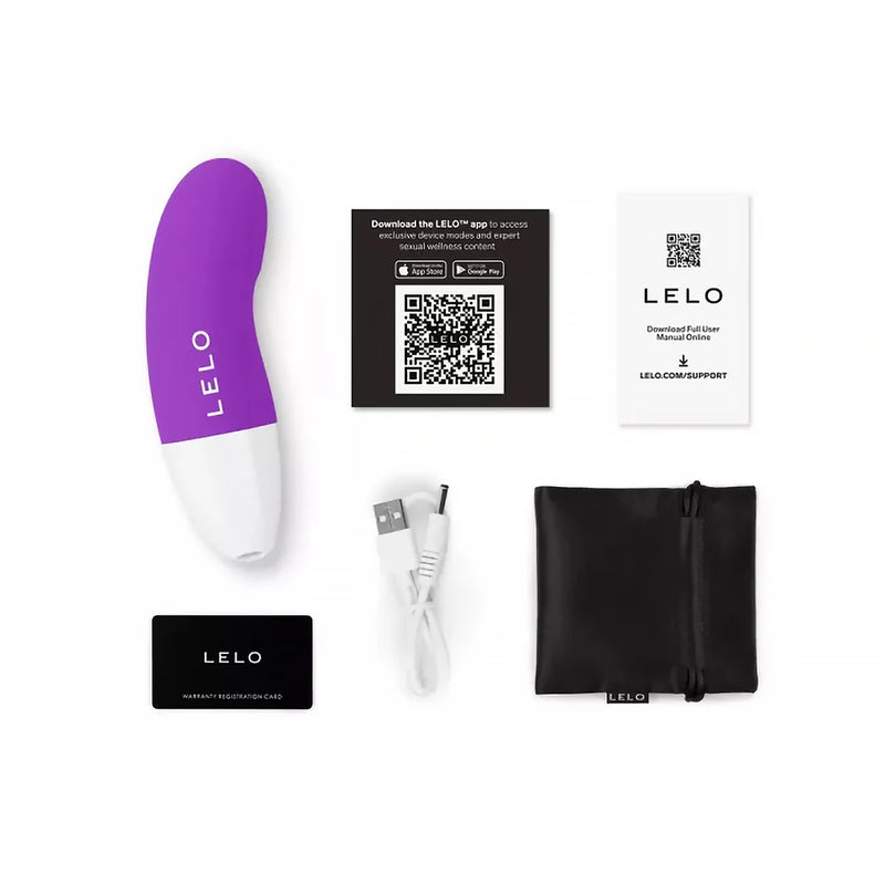 LELO AKO Originals Clitoral Vibrator and accessories including charging cable and user instructions.