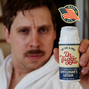 Dr Tuggs Gentleman's Masturbation Lotion 3.4 Oz held by a man in a bathrobe, promoting smooth solo time.