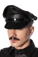 Prowler RED Military Cap Black Medium 57 cm worn by a man in a stylish leather outfit.
