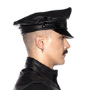 Prowler RED Military Cap Black Medium 57 cm worn by a model in profile view showcasing its leather style.