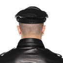 Rear view of a person wearing the Prowler RED Military Cap Black Medium 57 cm with a leather jacket.