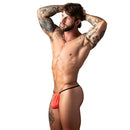 Male Power Kilauea Limited Edition G-String Coral One Size modeled by a tattooed man, showcasing vibrant color and minimal design.