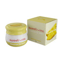 Sweetums Flavored Lip Balm Pineapple packaging and container, perfect for tropical lip care.
