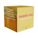Sweetums Flavored Lip Balm Honey packaging, featuring a colorful box with honey flavor label.