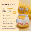 Sweetums Flavored Lip Balm Honey with built-in mirror and no-finger applicator, providing kiss-ready hydration.