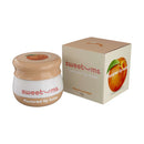 Sweetums Flavored Lip Balm Peach in jar and box, showcasing peach flavor and glossy finish.