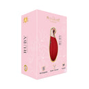The Pleasure Company Ruby Vibrating Necklace packaging on display, featuring rechargeable and stylish design.
