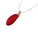The Pleasure Company Ruby Vibrating Necklace in rich wine red hue, discreetly blending jewelry with personal pleasure.