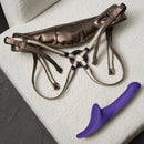 Strap-on-me Multi Orgasm Vibrating Dildo Medium Purple with harness on a plush surface.