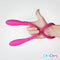 PicoBong Transformer Two Ended Vibrator Cerise held in hand, showcasing its flexible design and body-safe silicone.