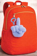 Fucks To Give Twirly Bird Keychain Plushie Blue attached to an orange backpack, showcasing playful attitude.